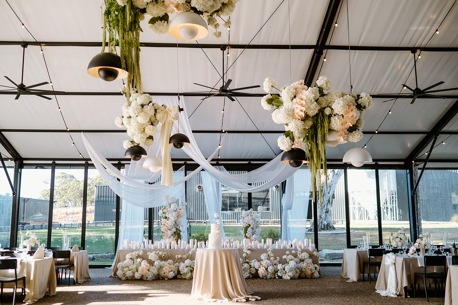 LOT.100 is a premium Adelaide Hills wedding venue with stunning views, flexible spaces, and lavish food and beverage packages featuring the best local brands.