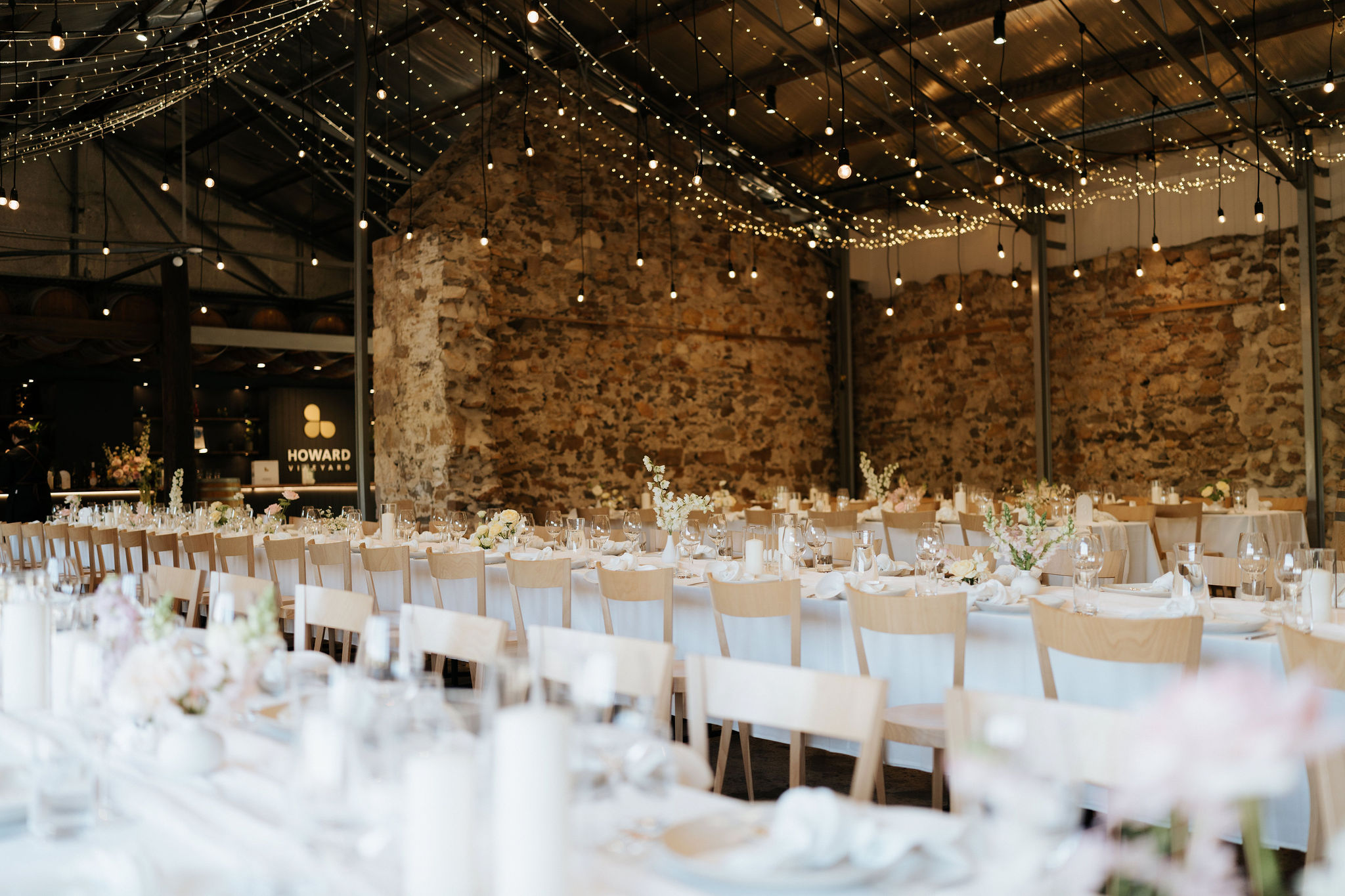 Celebrate among the vines at Howard Vineyard, featuring a majestic oak tree ceremony space, heritage stone barn receptions and award-winning Adelaide Hills wines.