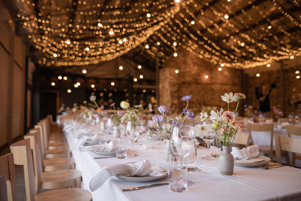 Celebrate among the vines at Howard Vineyard, featuring a majestic oak tree ceremony space, heritage stone barn receptions and award-winning Adelaide Hills wines.
